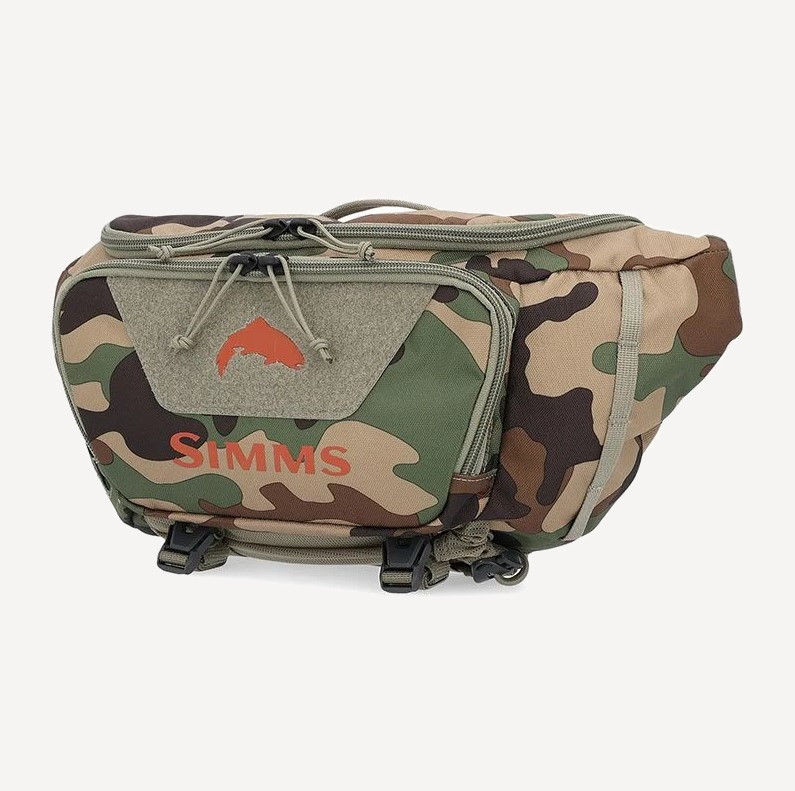 Сумка Simms Tributary Hip Pack 5L (Woodland Camo; 5л) Сумка Simms Tributary Hip Pack 5L (Woodland Camo; 5л)